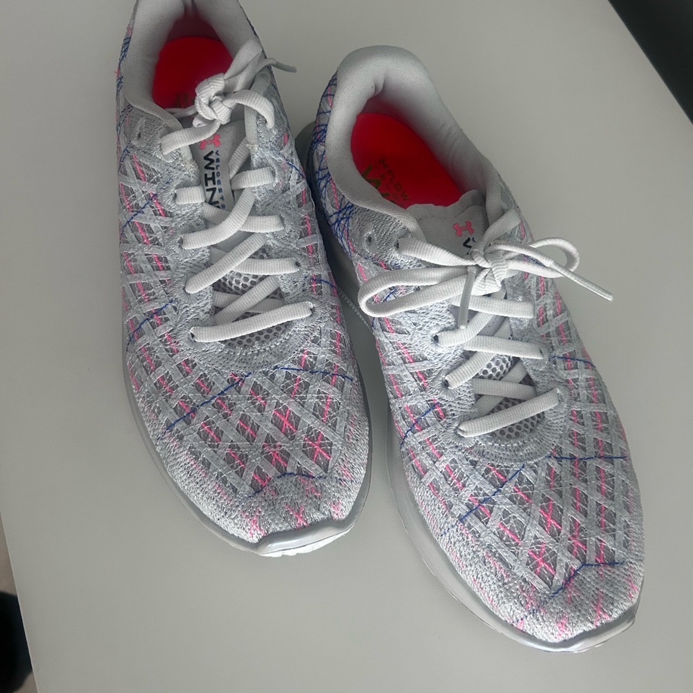 Under Armour Women’s White Running Shoes with Pink and Blue Accents